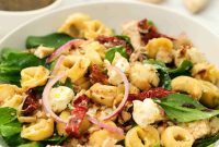 Creamy Italian Tortellini Salad with Sun-Dried Tomatoes & Basil