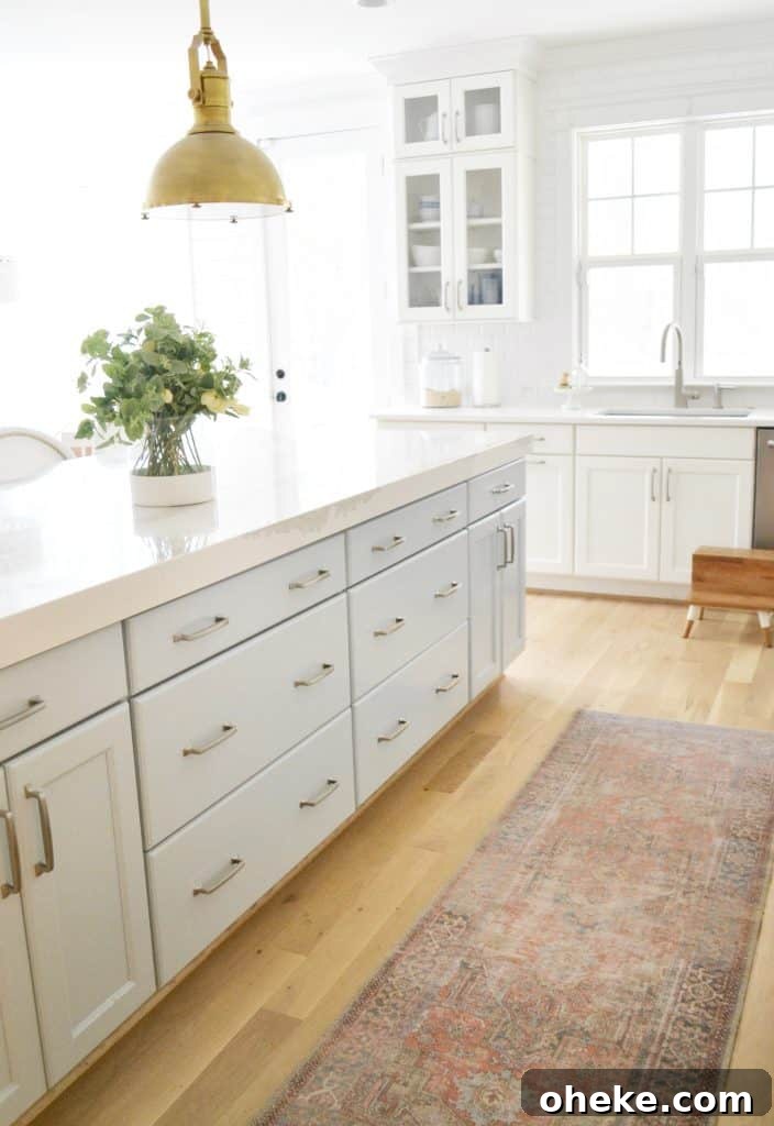 blue cabinets and a kitchen runner rug washable