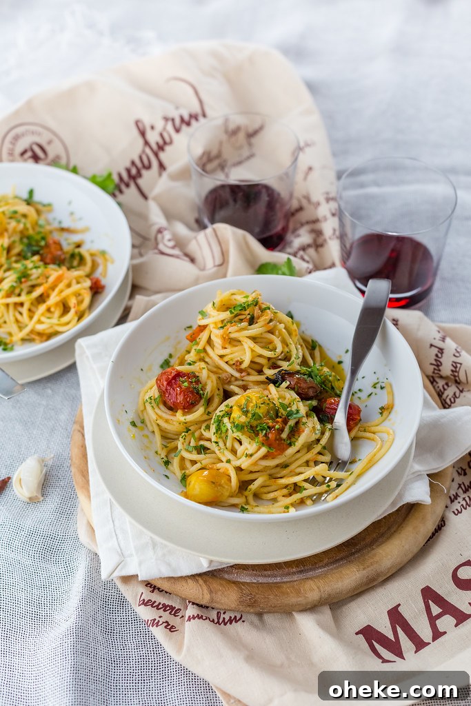 Spaghetti aglio e olio with slow-roasted tomatoes Spaghetti aglio e olio with slow-roasted tomatoes