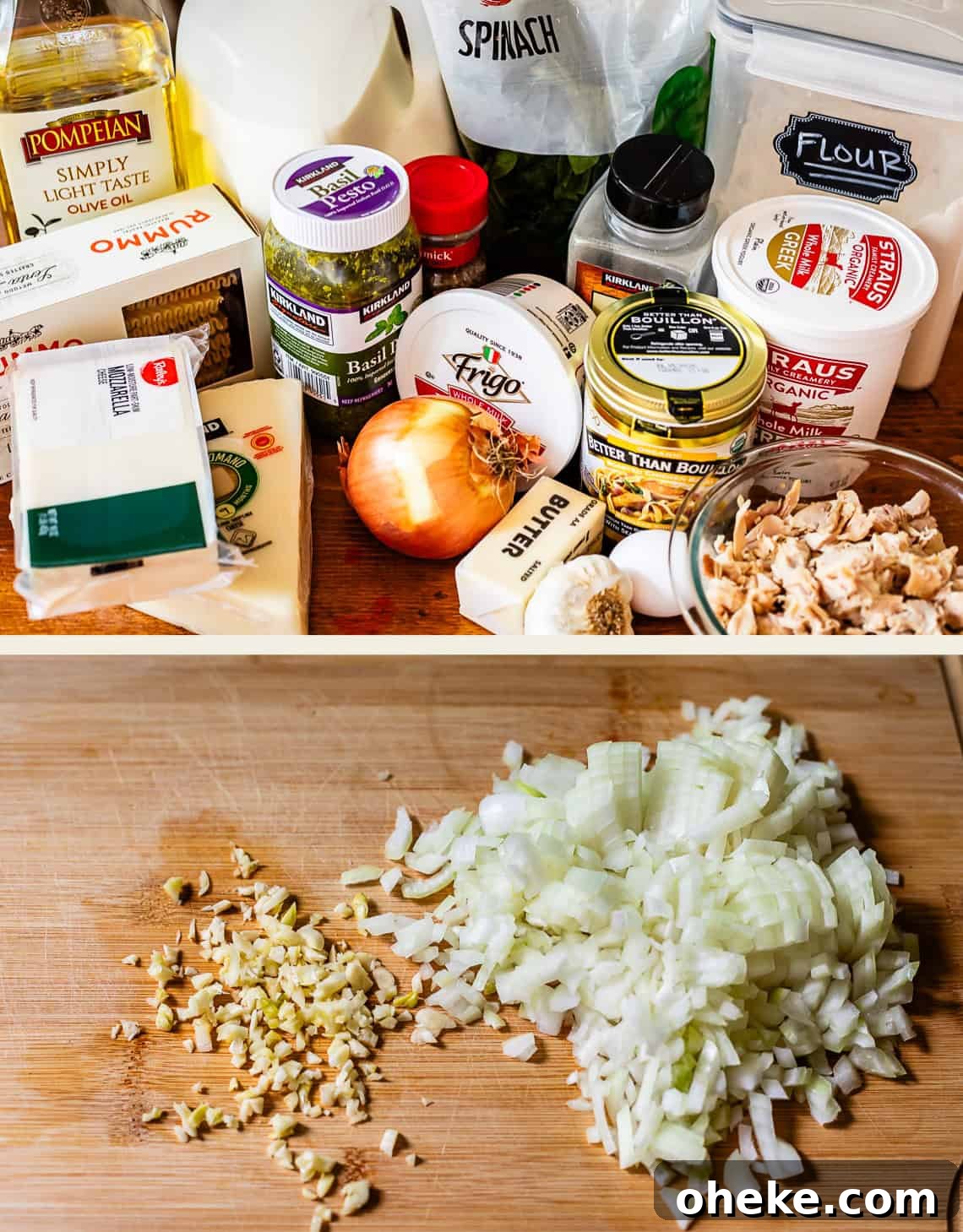 Various cooking ingredients are arranged on a counter, including olive oil, milk, spinach, flour, cheese, broth, onion, garlic, and butter. Below, chopped onion and minced garlic are on a wooden cutting board.