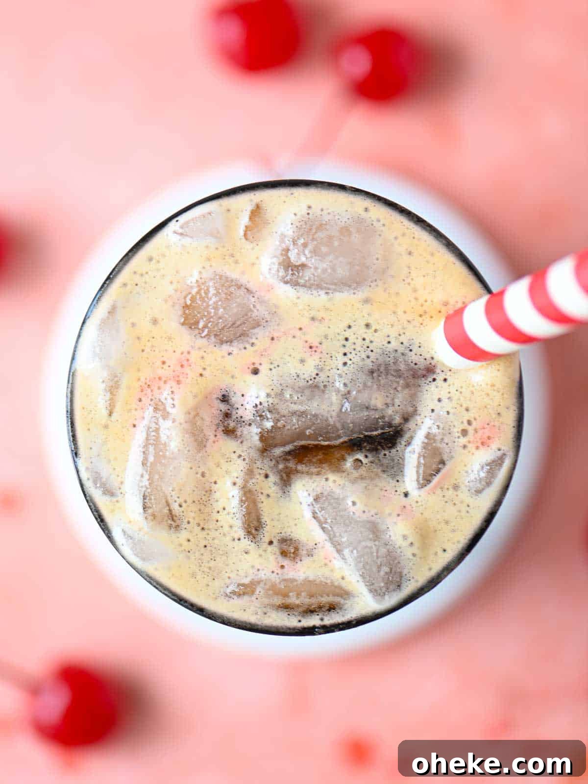 Cherry Americola: Refreshing Cherry-Flavored Coffee Drink 3 Overhead of the top of a cherry americola, highlighting the carbonation.