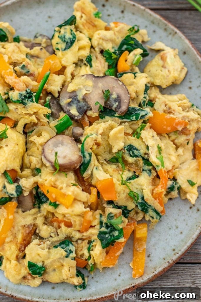 Closer shot of scrambled eggs with vegetables