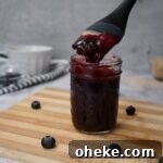 Tangy Blueberry BBQ Sauce Recipe for Grilling & Glazing 9 Mason jar filled with blueberry bbq sauce