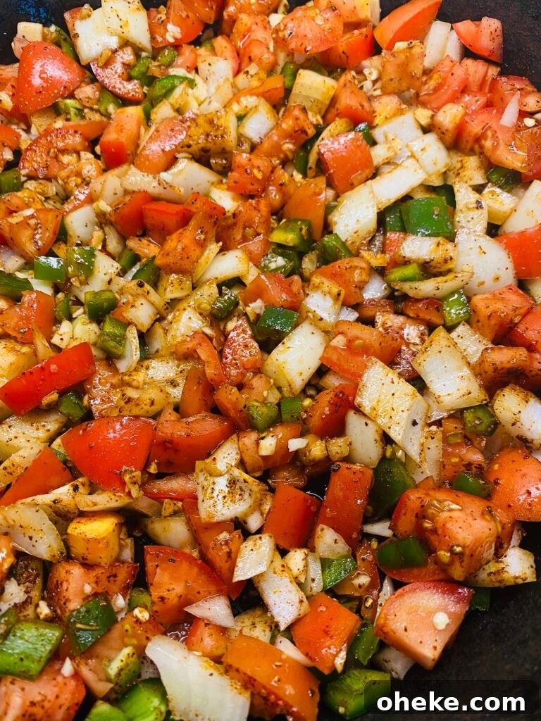 Smoked Tequila-Lime Shrimp Recipe for Flavorful Grilled Shrimp 4 cut tomatoes and peppers in a cast iron skillet before smoking