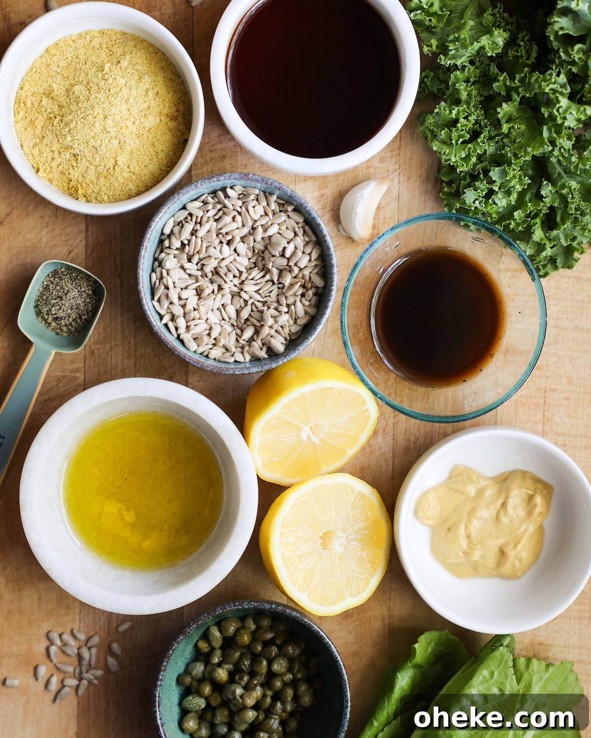 Creamy Vegan Caesar Dressing Recipe for Salads and Sandwiches 3 vegan caesar salad ingredients on butcher block