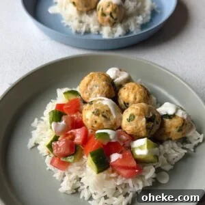 Greek-Style Chicken and Feta Meatballs with Lemon Herb Sauce 12 Chicken feta meatballs served over rice.