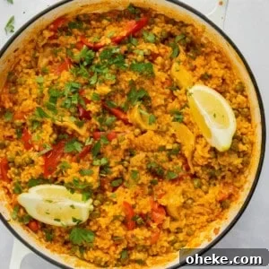 overhead shot of paella in large white pan