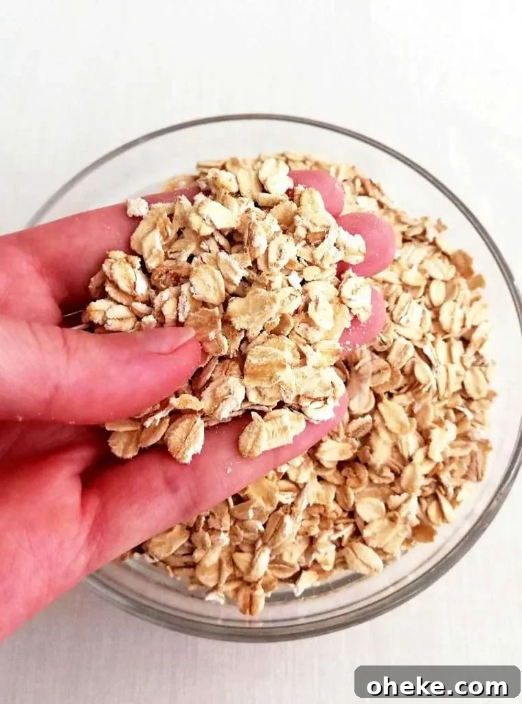 oatmeal cookies rolled oats in hand