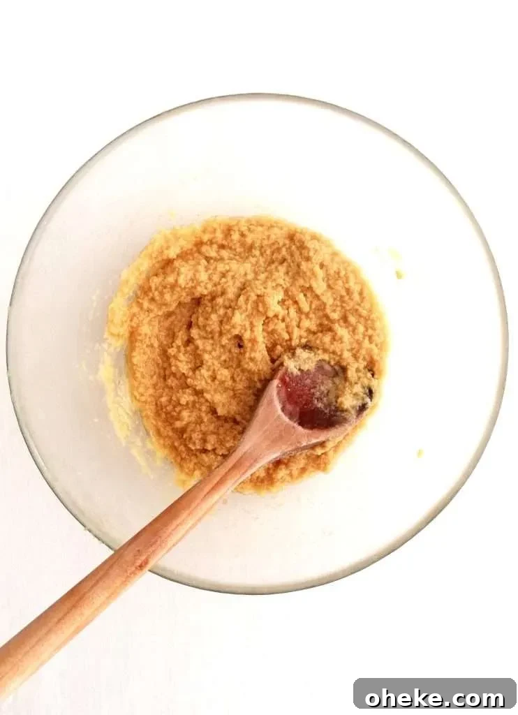 oatmeal cookies egg and vanilla whisked into butter mix