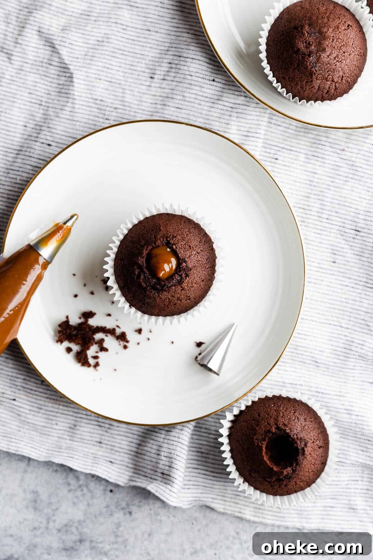 overhead shot of chocolate cupcake filled with dulce de leche