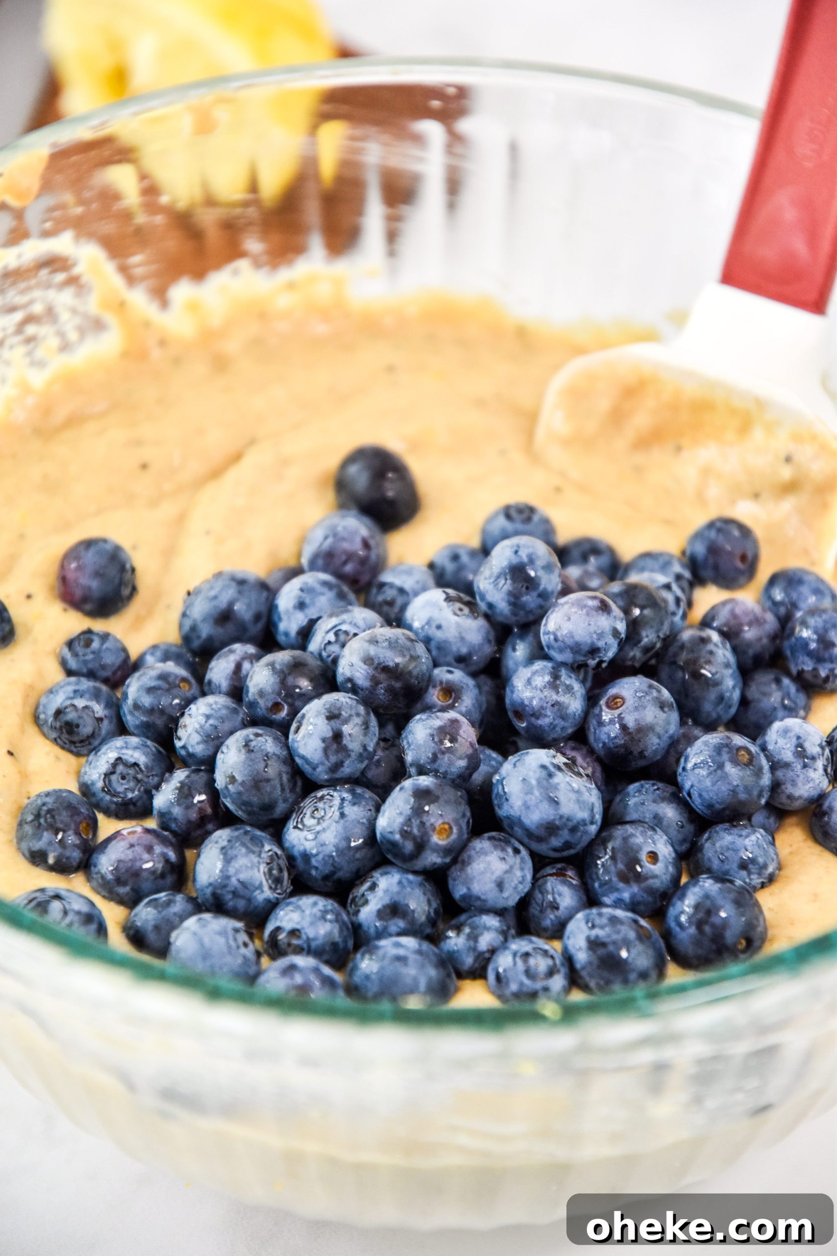 blueberries added to the batter for the pancake mix muffins.