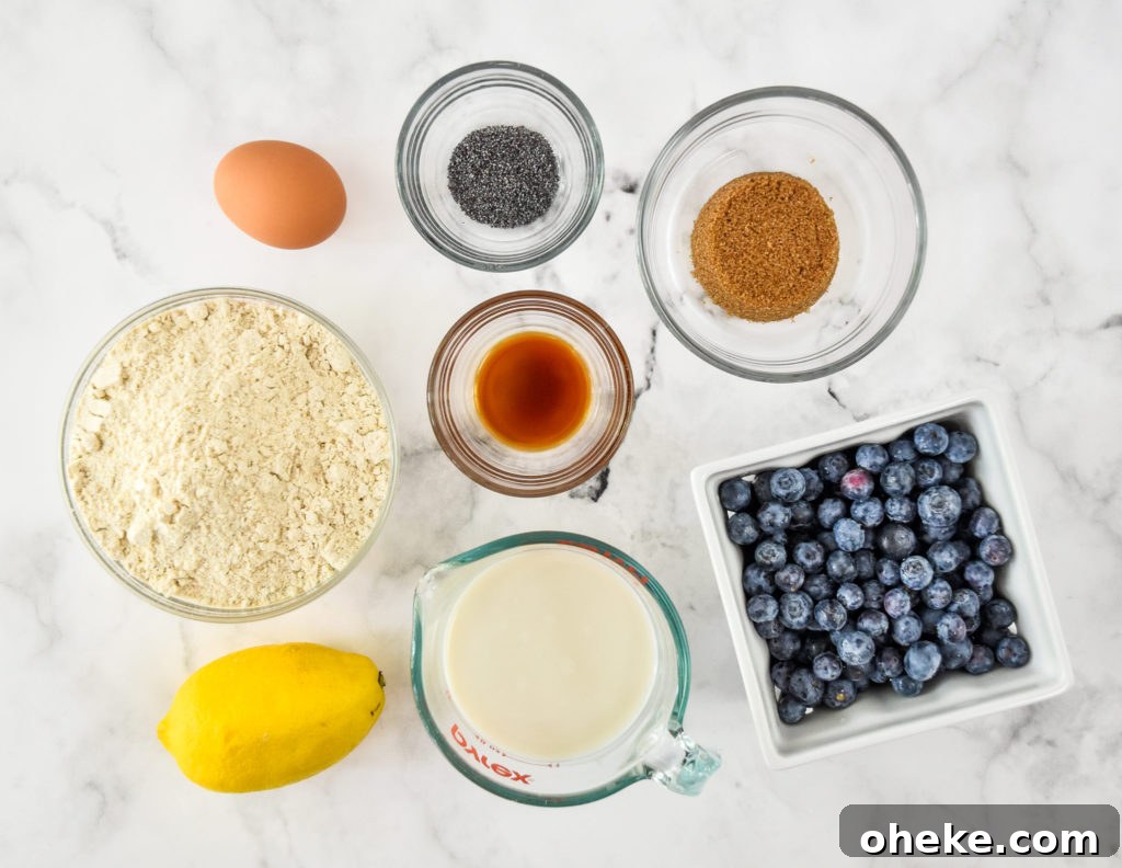 ingredients in the blueberry lemon pancake mix muffins in separate bowls.