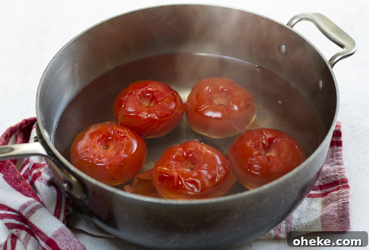 Tomato Jam Linzer Thins: Savory Cheese Shortbread Cookies 7 Poach the tomatoes in boiling water until the skins wrinkle and loosen. Cool, peel and chop