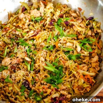 step 2 of egg roll in a bowl in a large wok.