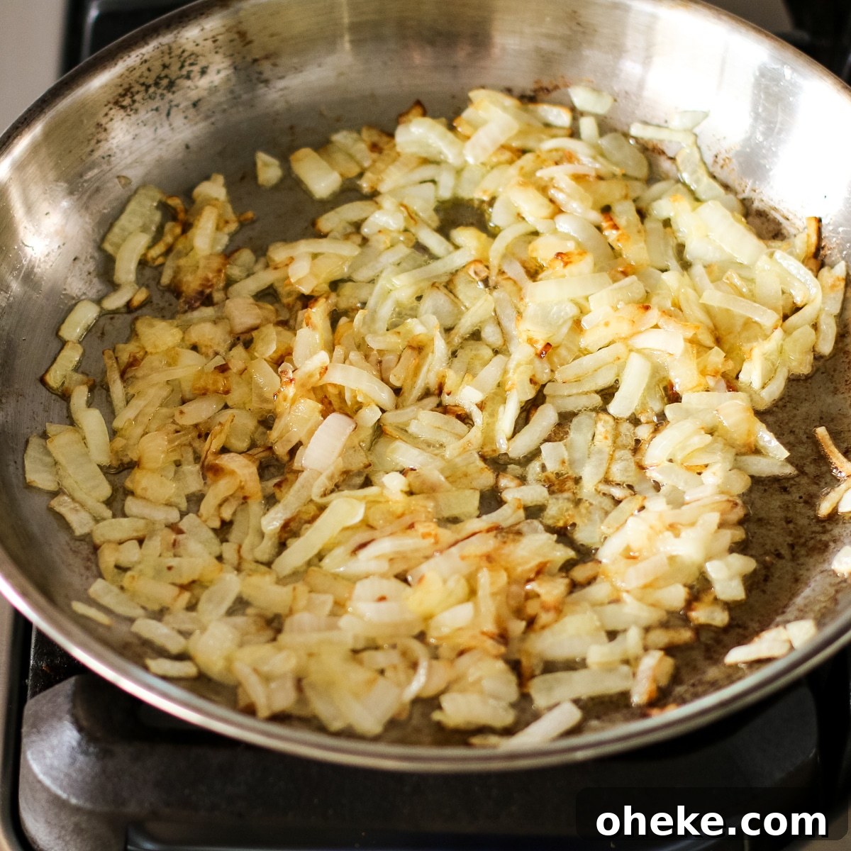 carmalized onions cooking in a pan.