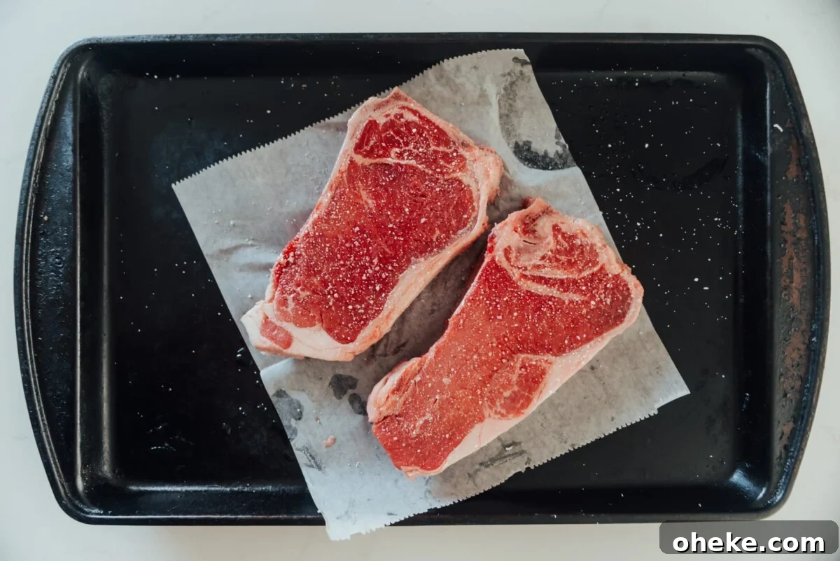 Strip steaks on sheet.