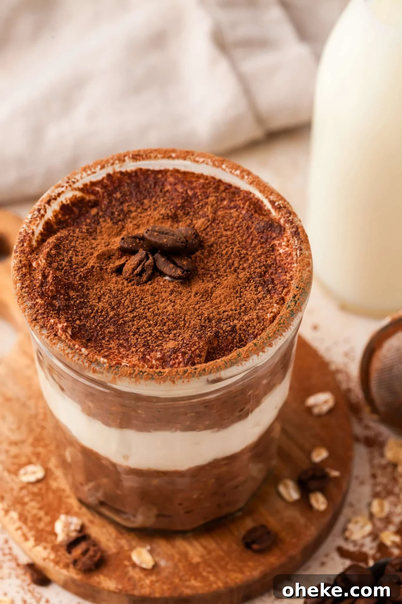 Based on the Italian coffee-infused dessert, these tiramisu overnight oats are a delicious, surprisingly nutritious way to start the day. Overhead image of tiramisu overnight oats.