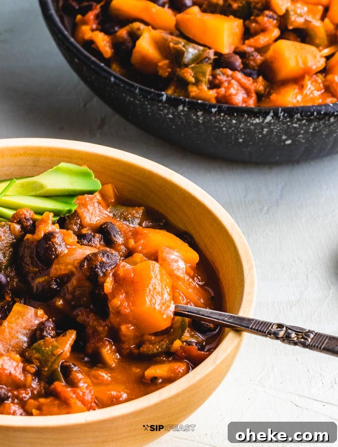 Final closeup of the roasted poblano peppers with stewed butternut squash chili.