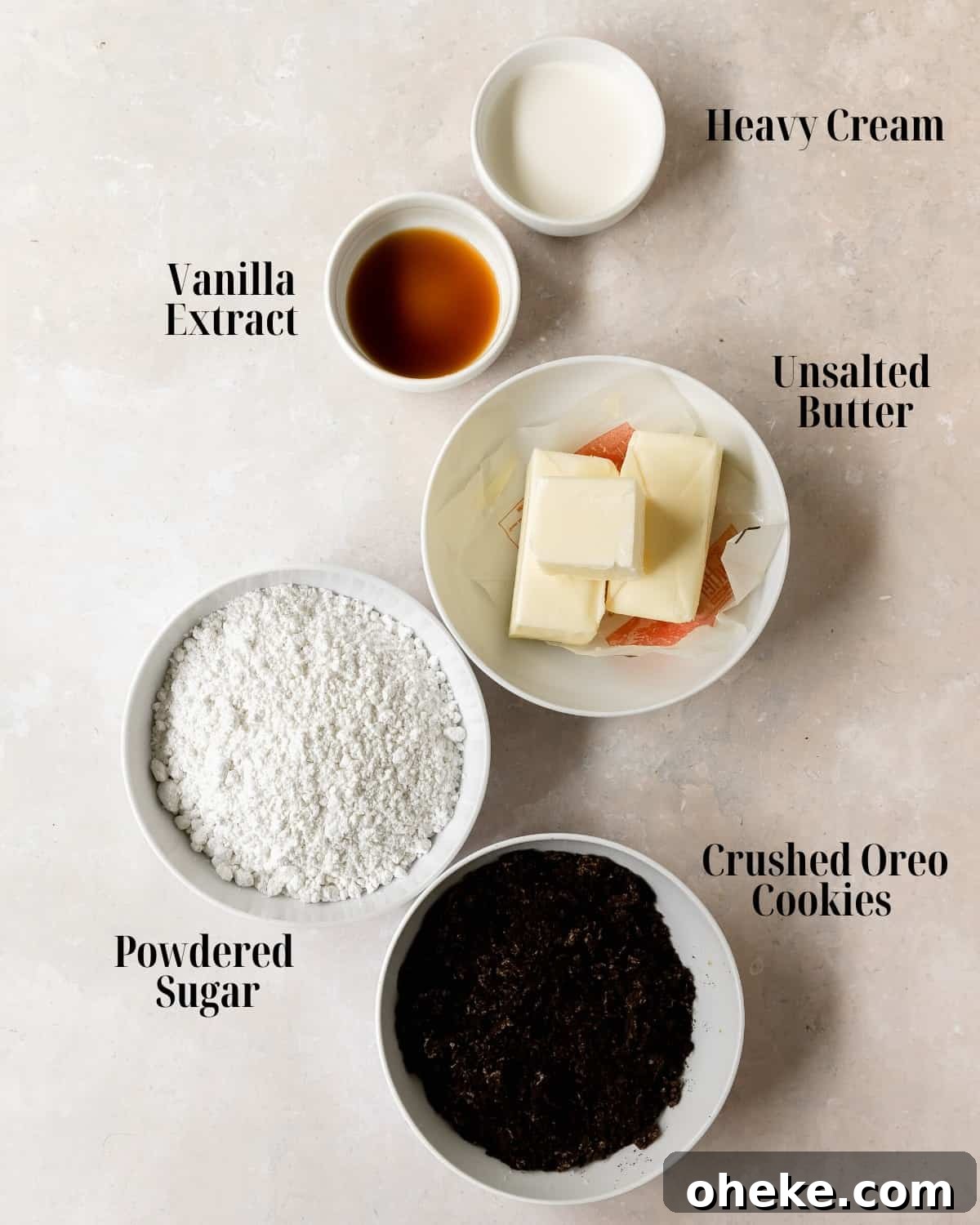 Oreo Frosting Ingredients:  Gather unsalted butter, powdered sugar, heavy cream, vanilla extract and Oreo cookies.