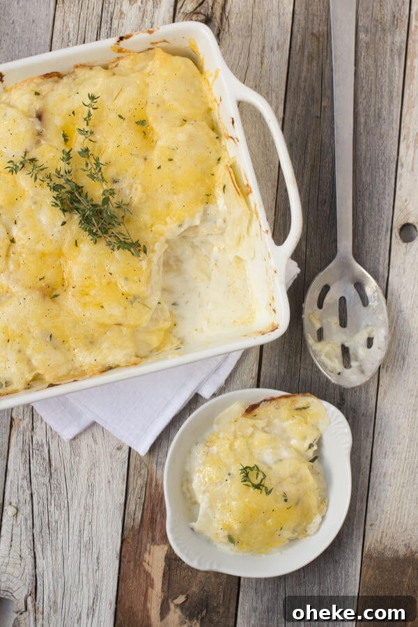 Smoked Gruyère Scalloped Potatoes with Sautéed Leeks 6 Scalloped Potatoes are one of our favorite Sunday dinner sides especially if guests are coming to dinner. #recipe ohsweetbasil.com-4
