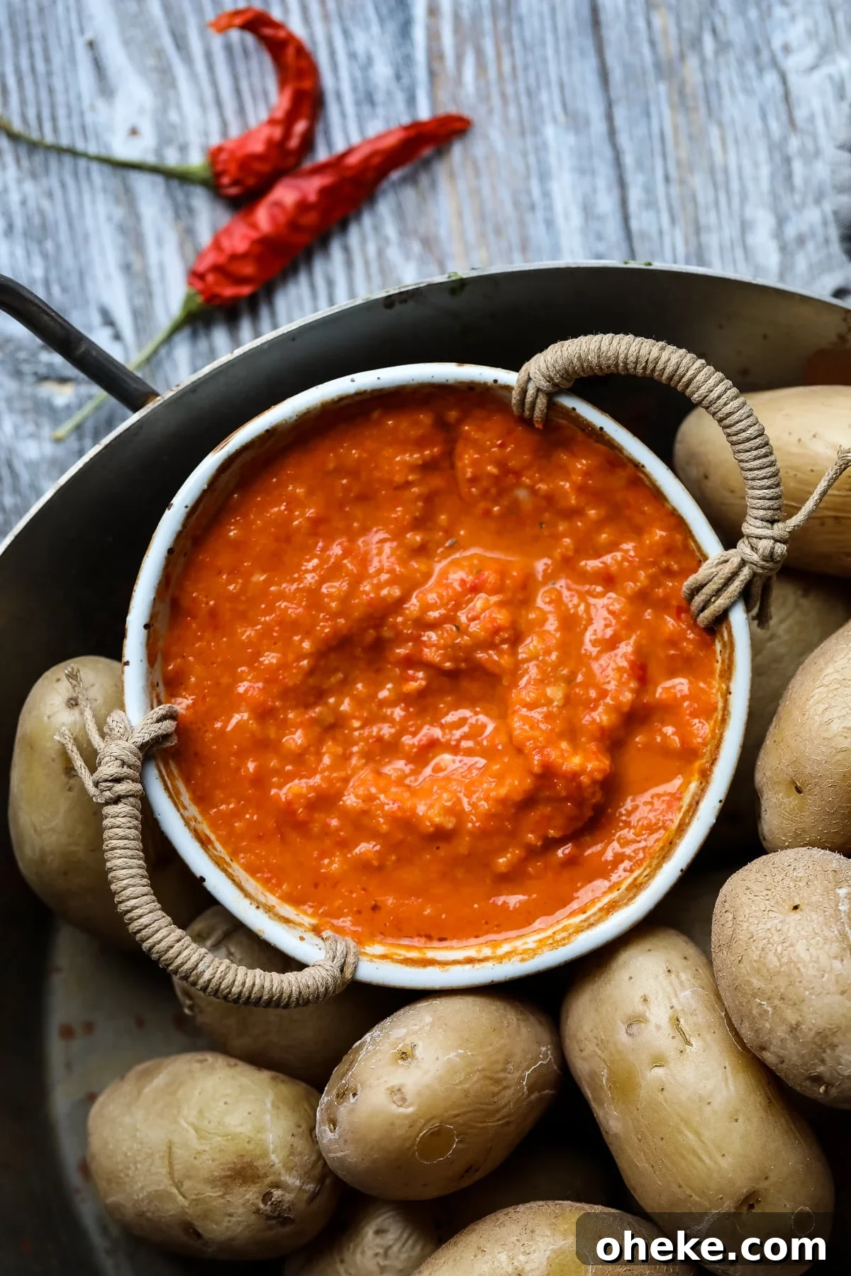 Mojo Rojo (Canarian Red Sauce): Authentic Recipe & Uses 3 Mojo rojo served with papas arrugadas.