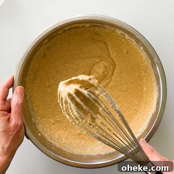 Peanut Butter Banana Protein Pancakes with Cottage Cheese Filling 6 Peanut butter pancake batter in a mixing bowl ready to cook.