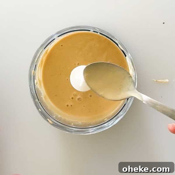 Peanut Butter Banana Protein Pancakes with Cottage Cheese Filling 10 Peanut butter sauce mixed in a chopper cup.