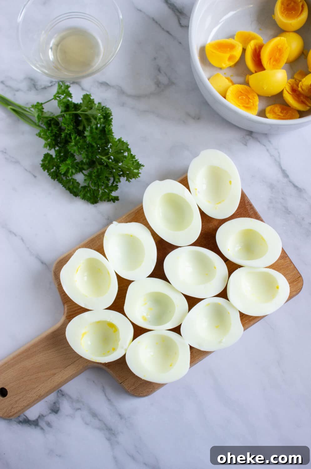 Pumpkin-Spiced Deviled Eggs for Low-Carb Fall Brunch 6 halves of boiled eggs ready to be filled