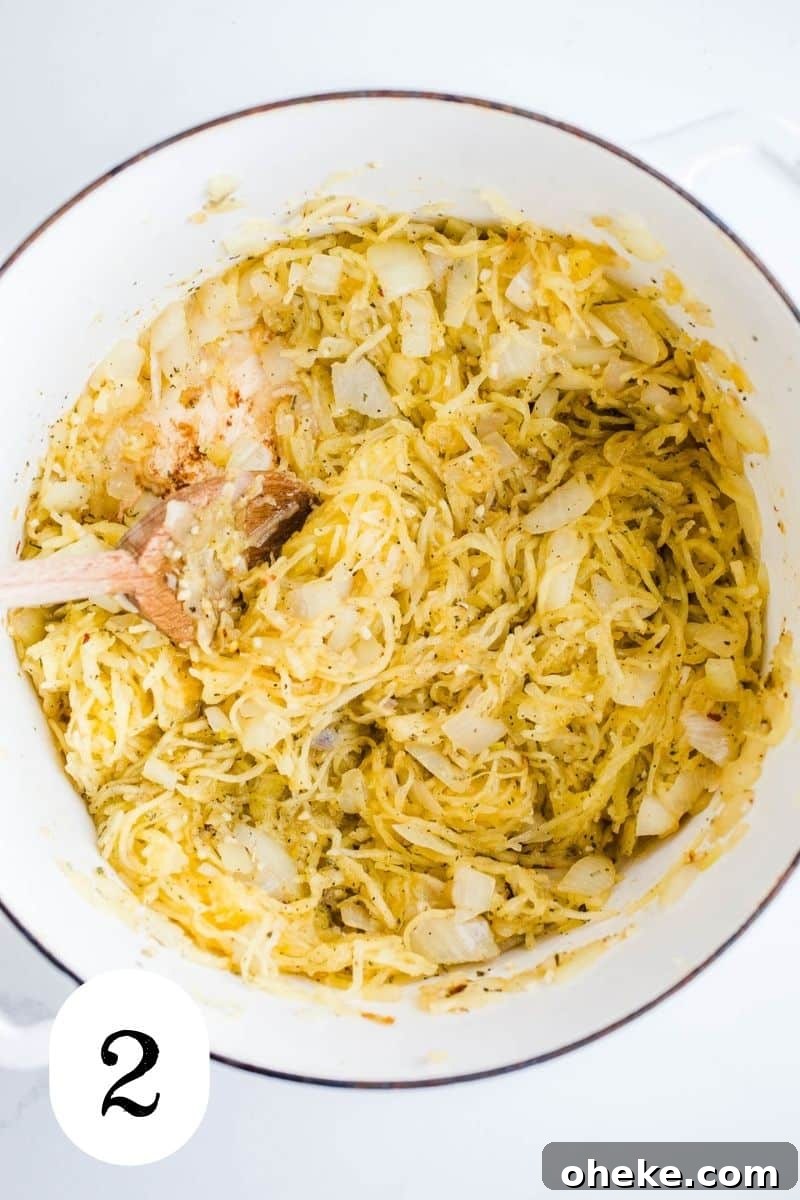 Vegetable noodles and seasoning in a white pot.