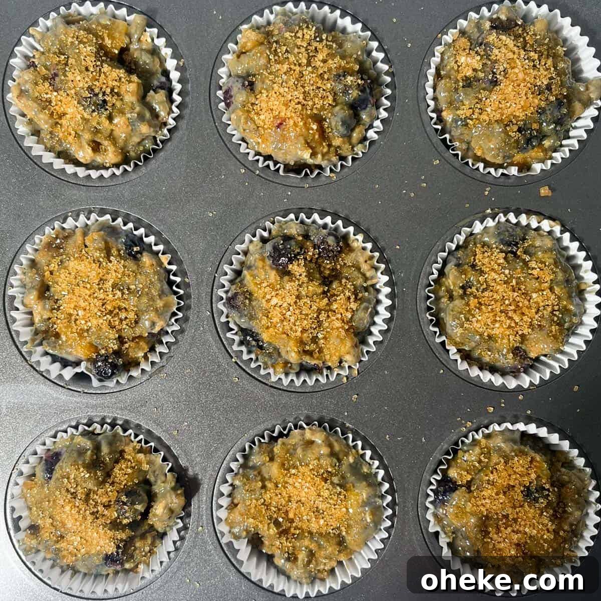 Moist Buttermilk Blueberry Muffins Recipe for Perfect Muffins 11 Unbaked buttermilk blueberry muffins sprinkled with demerara sugar.