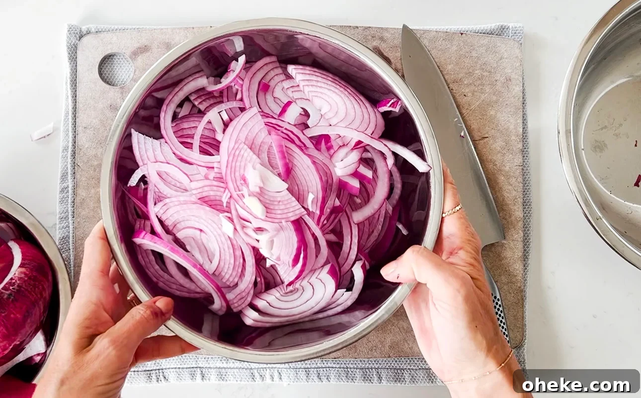Pissaladière: French Onion and Anchovy Tart Recipe (Video) 8 A bowl of sliced red onions