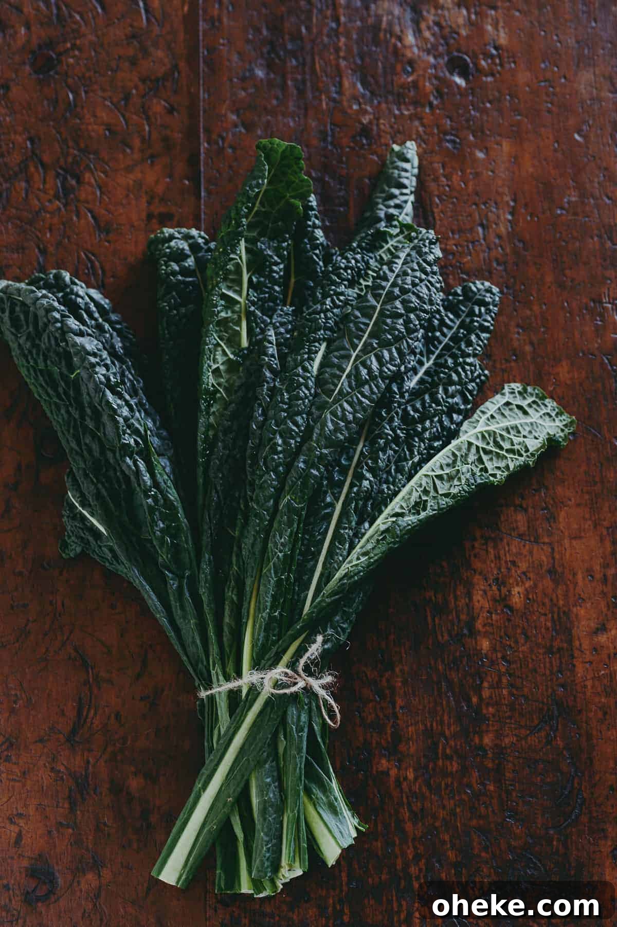 Tuscan Black Kale: Nutritional Benefits and Cooking Ideas 2 a bunch of cavolo nero (black kale) on a wooden table