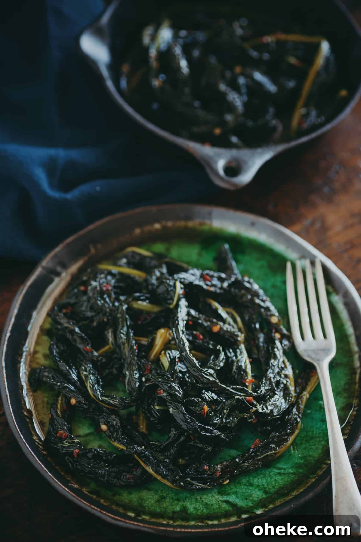 Tuscan Black Kale: Nutritional Benefits and Cooking Ideas 3 braised cavolo nero on a green plate