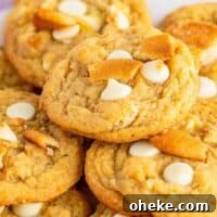 up close stacked banana pudding cookies on white plate