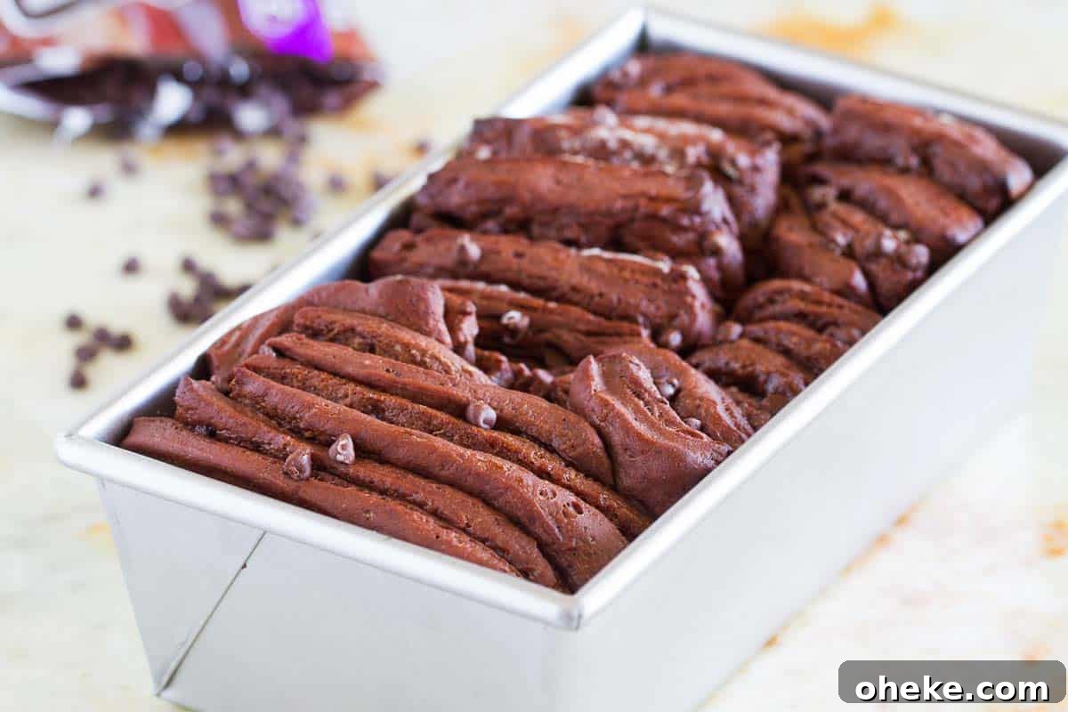 Decadent Chocolate Pull-Apart Bread Recipe 3 Chocolate pull apart bread in a loaf pan.