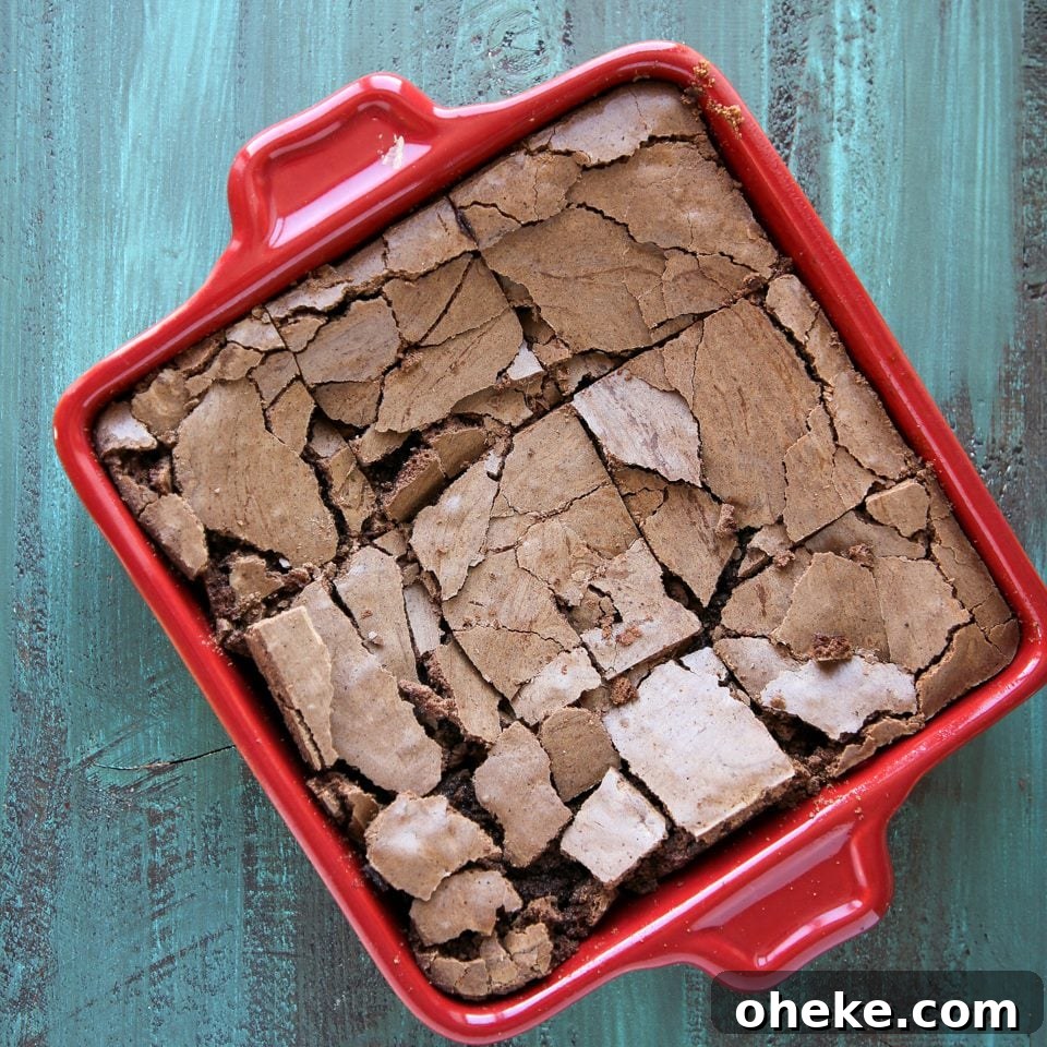 Browned Butter Brownies on a blue countertop.