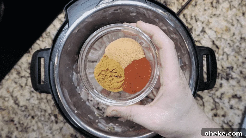 Adding spices to pot