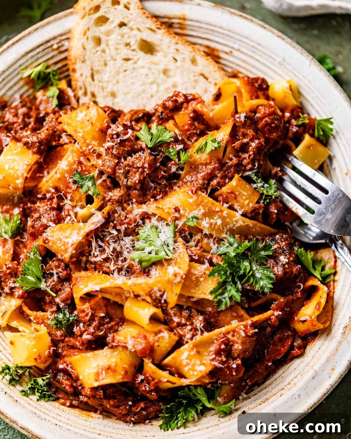 Short Rib Bolognese Recipe: Slow-Simmered, Rich Italian Ragu 12 up close photo of short rib ragu on a plate.