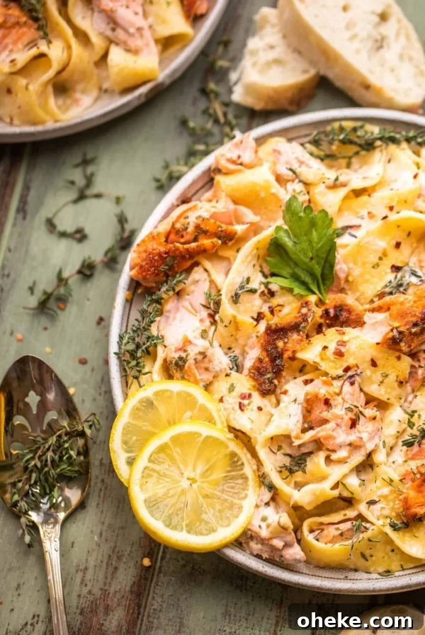 Short Rib Bolognese Recipe: Slow-Simmered, Rich Italian Ragu 13 salmon pasta on a plate with lemon and a spoon next to the plate with fresh thyme