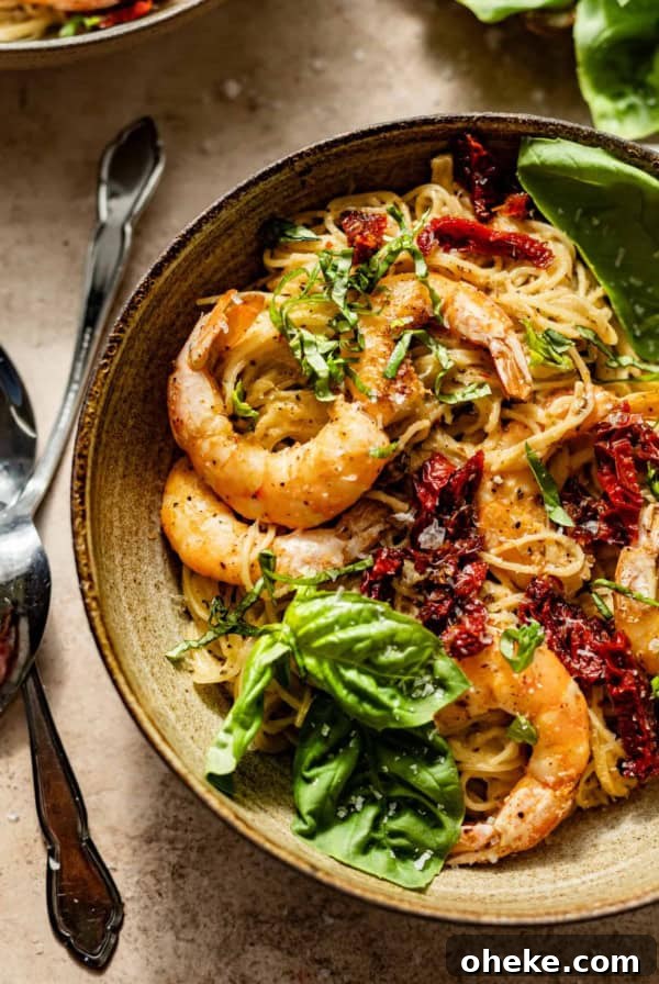 Short Rib Bolognese Recipe: Slow-Simmered, Rich Italian Ragu 15 pesto pasta with shrimp in a large bowl with forks and spoons