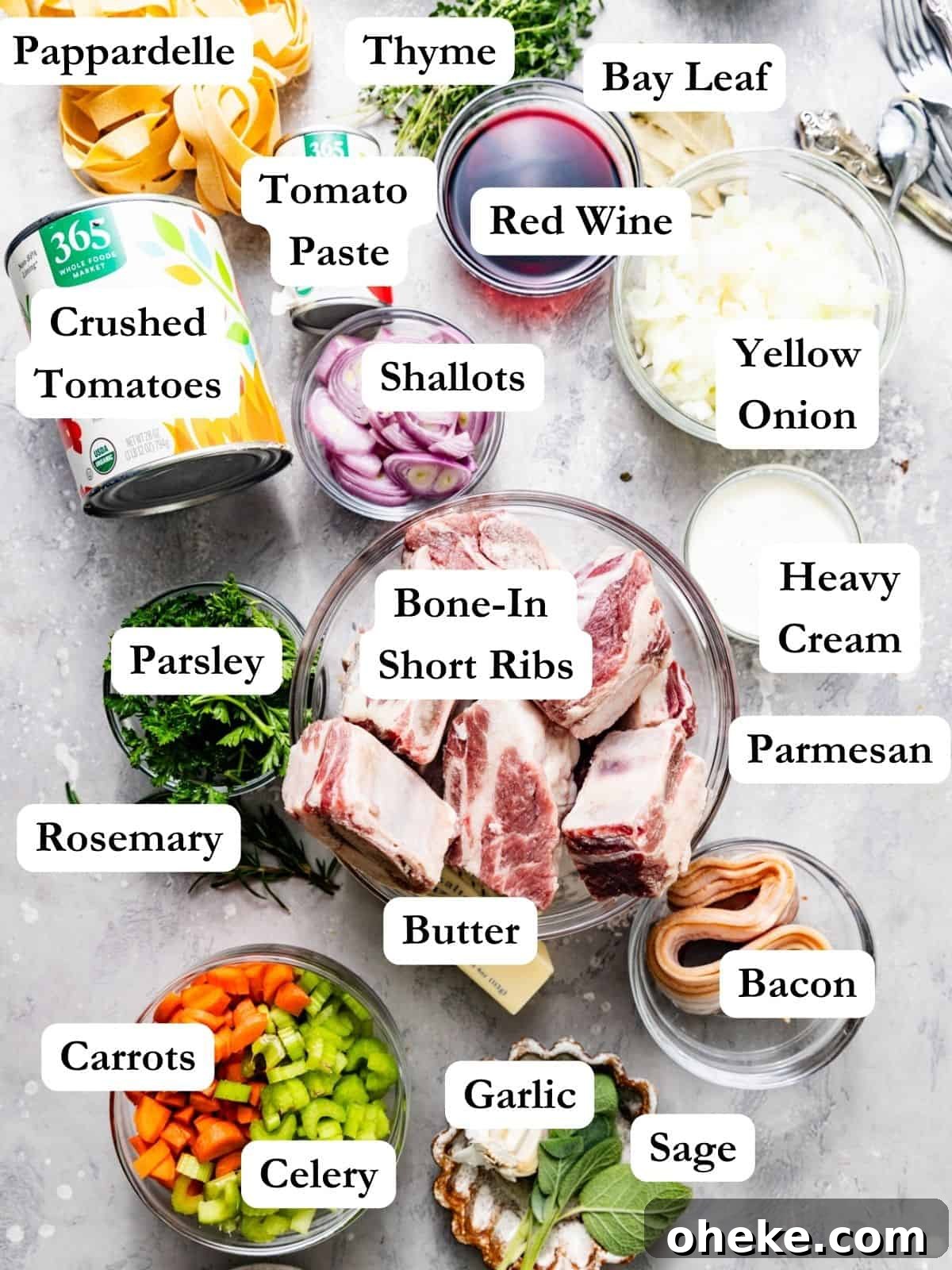 Short Rib Bolognese Recipe: Slow-Simmered, Rich Italian Ragu 3 ingredients to make short rib bolognese on a white surface.