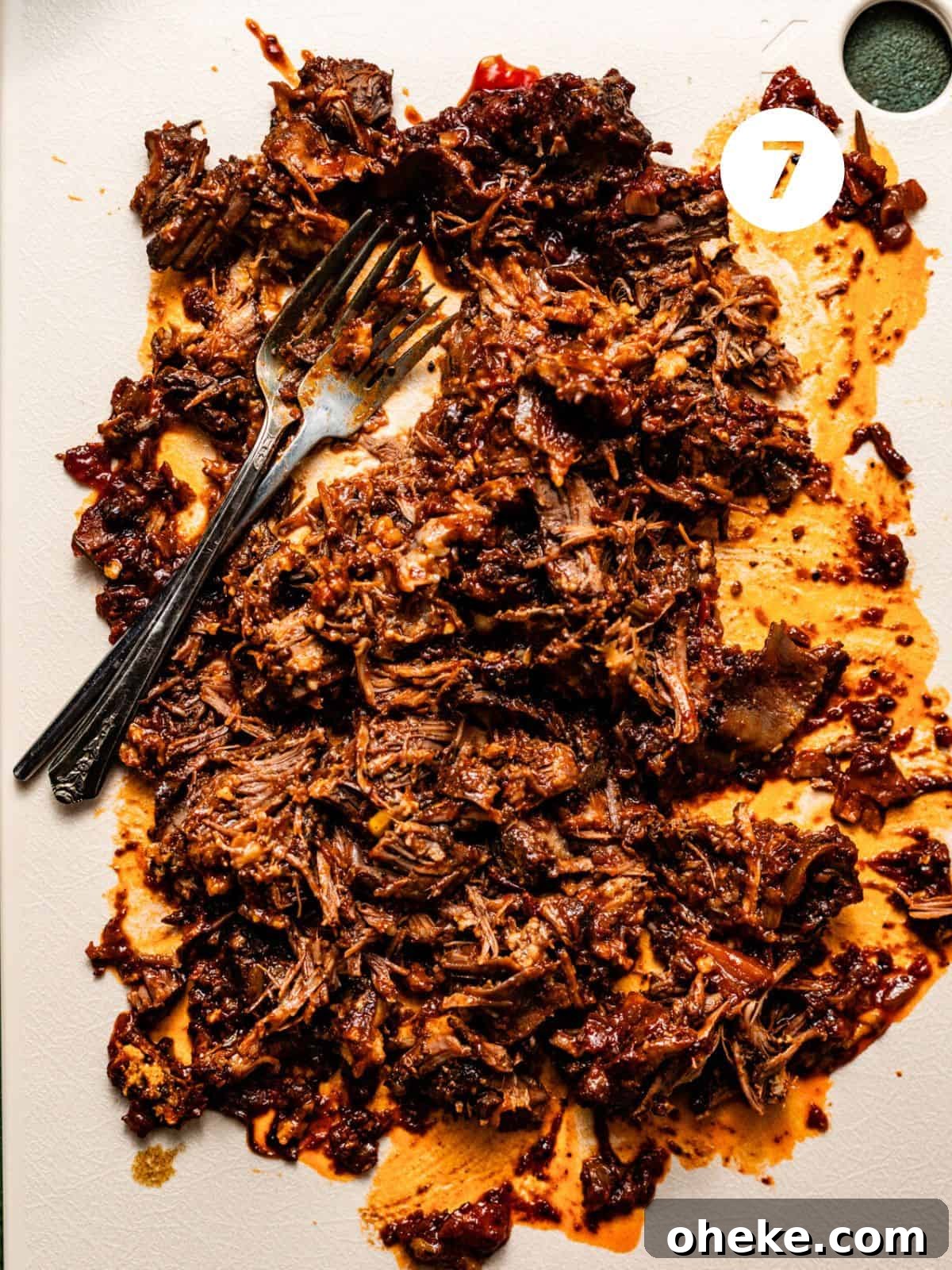 Short Rib Bolognese Recipe: Slow-Simmered, Rich Italian Ragu 10 shredded short rib meat on a cutting board.