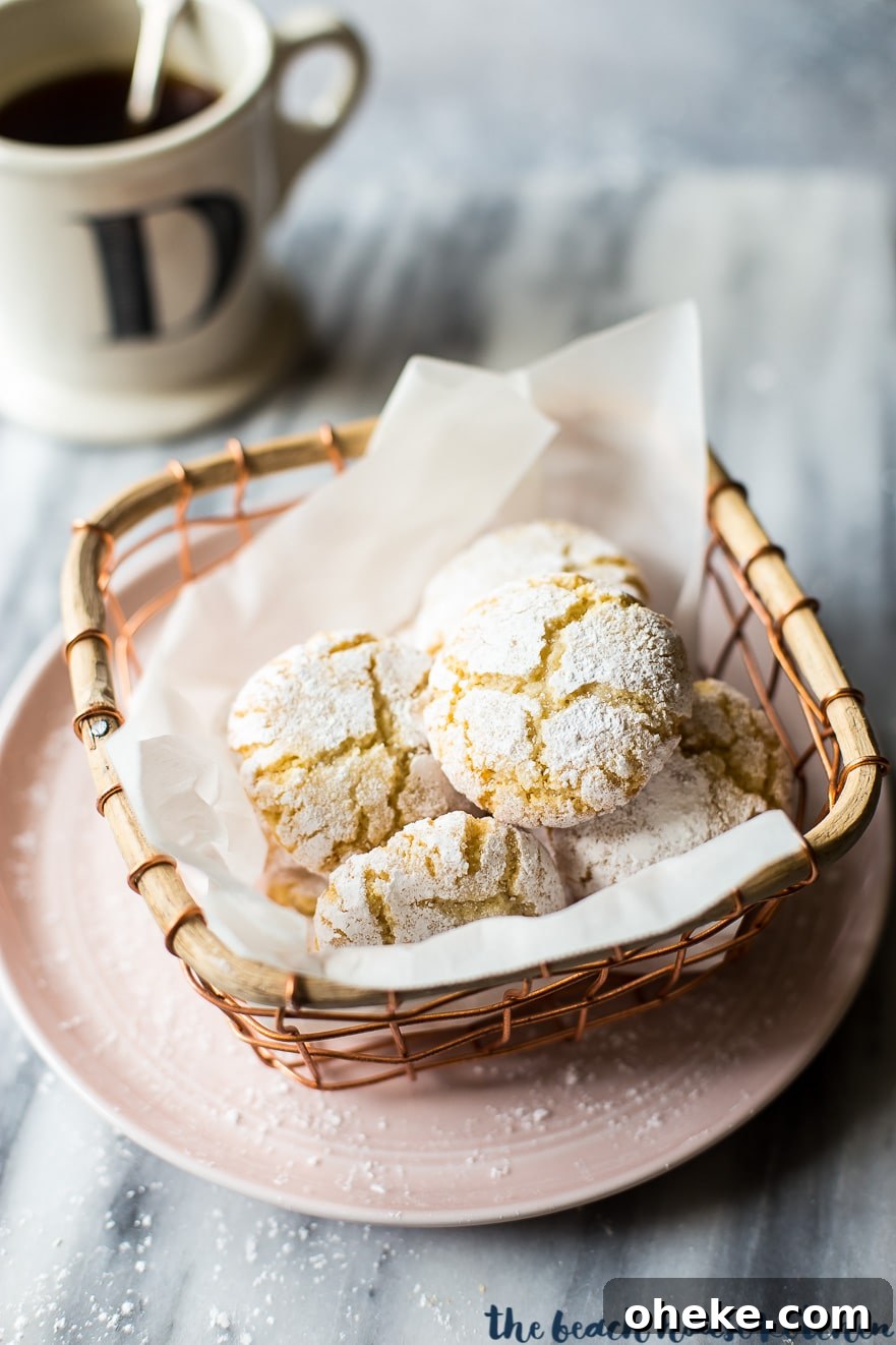 Classic Italian Amaretti Cookies Recipe — Crispy, Almond-Flavored Treats 6 Amaretti cookies in a wire basket
