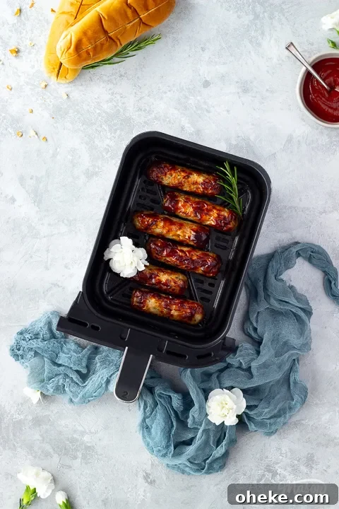 Air Fryer Buying Guide: What to Know Before You Buy 6 Air fryer sausages on a grey worktop