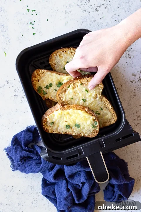 Air Fryer Buying Guide: What to Know Before You Buy 13 Air fried cheese on toast in a drawer with a napkin
