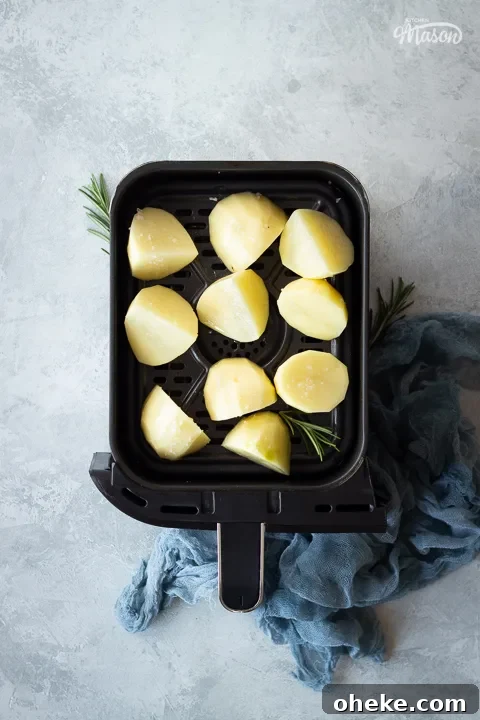 Air Fryer Buying Guide: What to Know Before You Buy 4 Prepped potatoes in an air fryer drawer