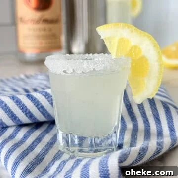 Lemon drop shot with lemon wedge.