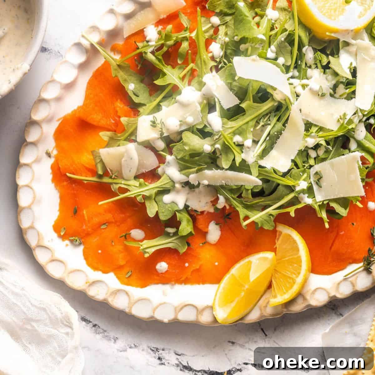 Build a Bloody Mary Bar: DIY Cocktail Station Guide 14 Salmon carpaccio appetizer with arugula and parmesan.