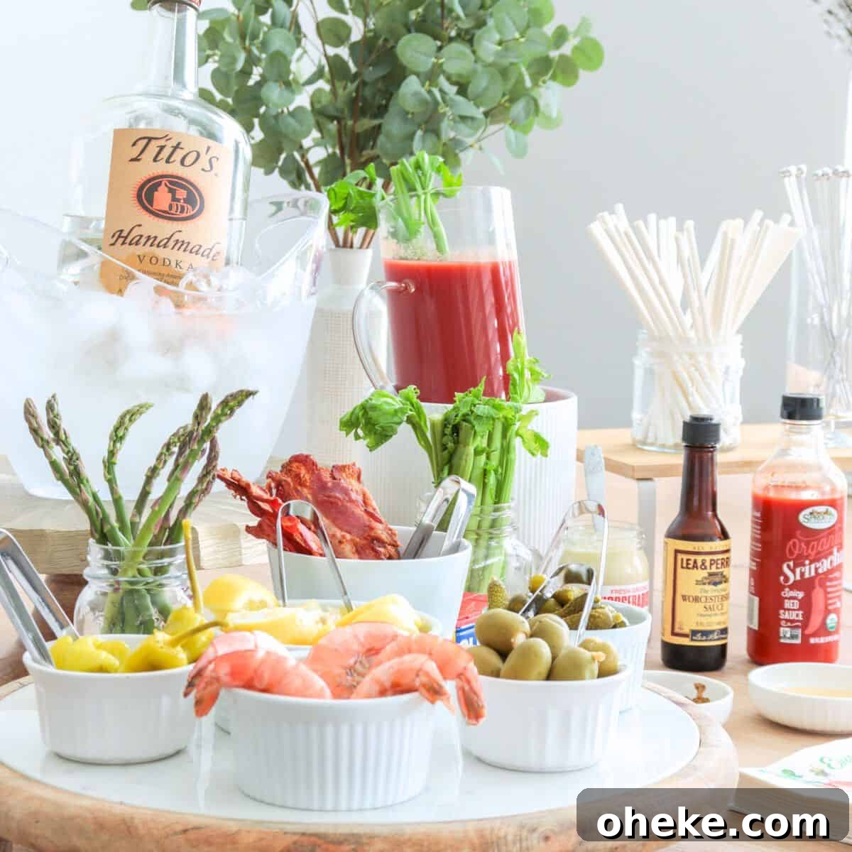 Build a Bloody Mary Bar: DIY Cocktail Station Guide 16 Bloody mary bar idea with condiments on the side.