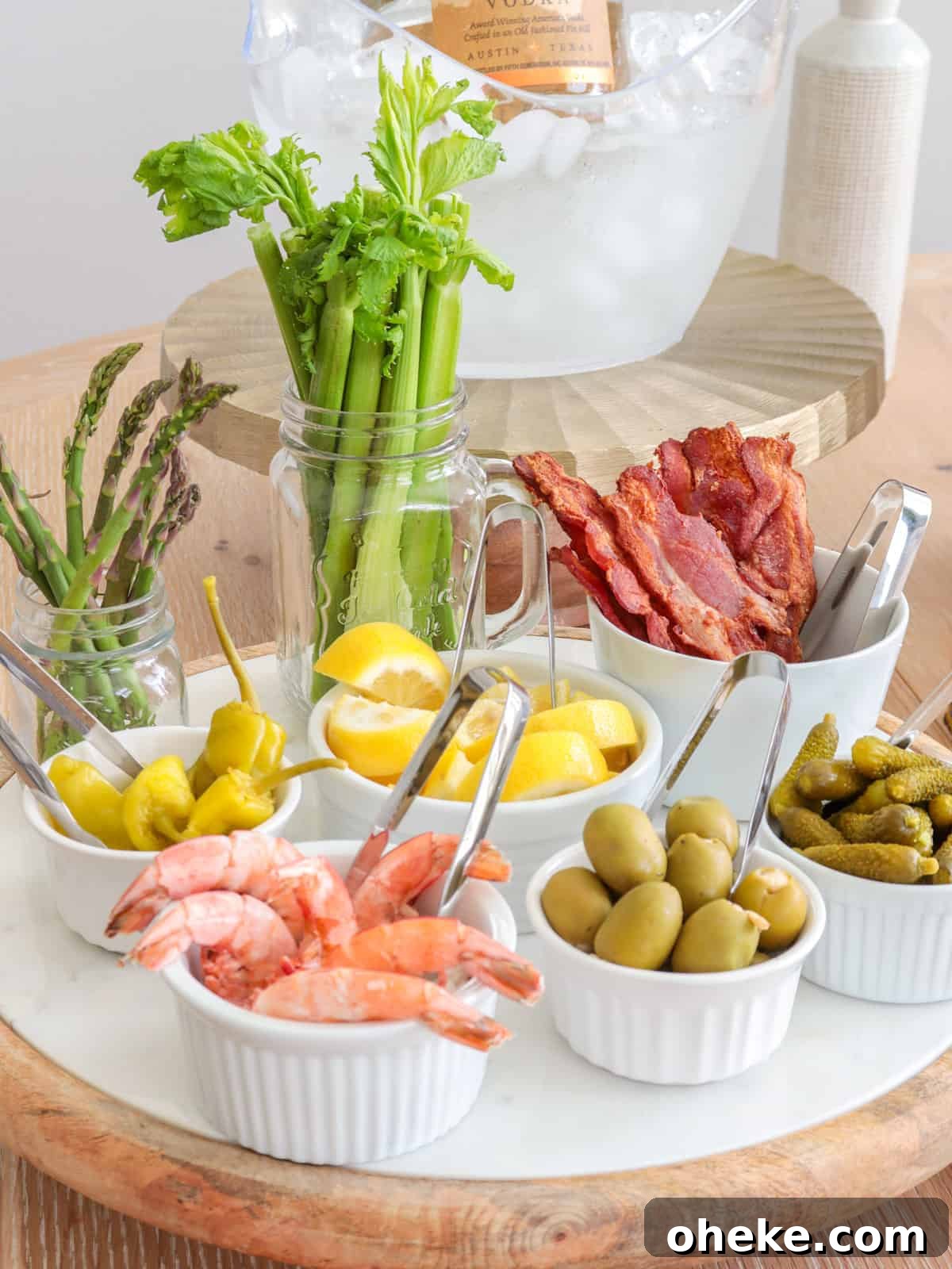 Build a Bloody Mary Bar: DIY Cocktail Station Guide 3 Bloody mary bar add-ins placed in small bowls.